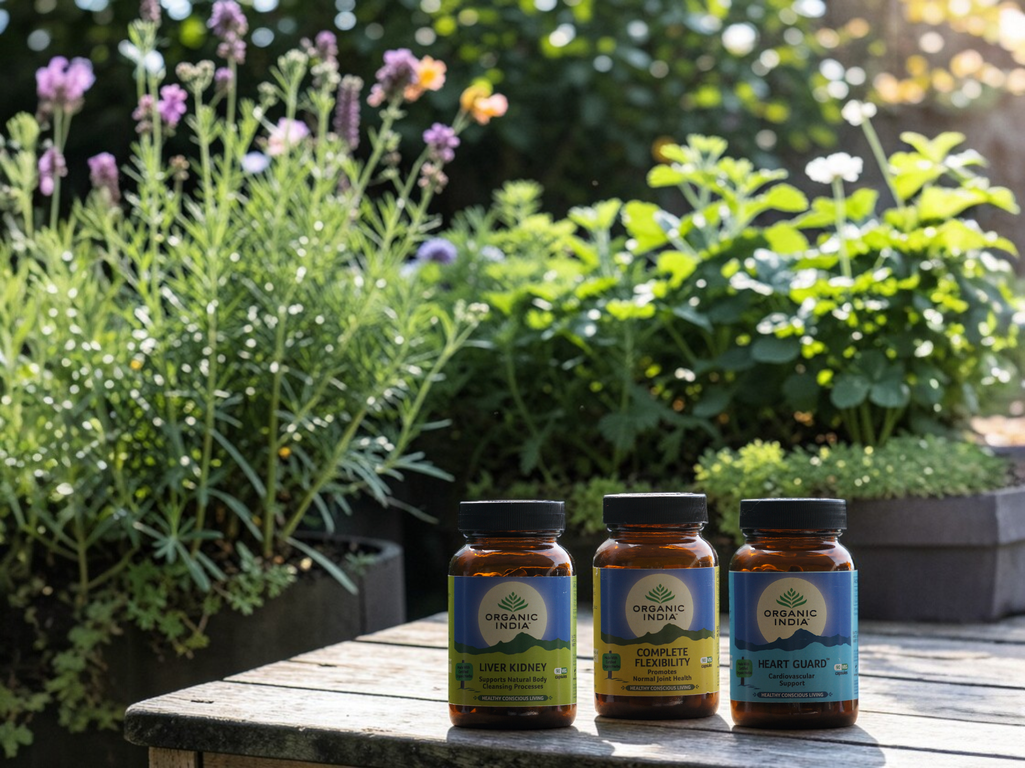 Three bottles of organic supplements on a wooden table with plants in the background